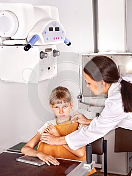 Child with doctor radiologist.