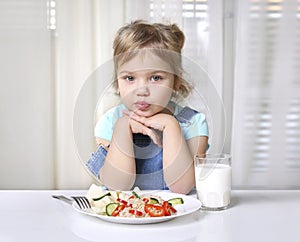 Child does not want to eat.Kid girl refuses meal.No appetite