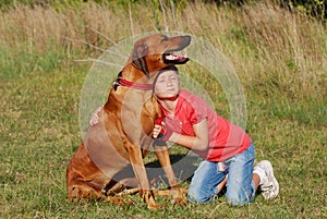 Child and dog - Happy Friendship