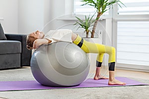 Child Doing Back Stretch on Fitness Ball