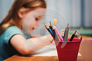 child draw with color crayons