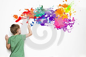 Child drawing an abstract picture photo