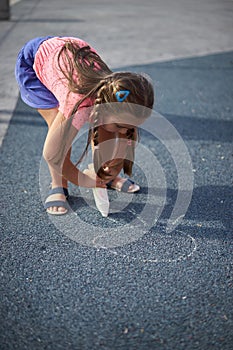 Child Drawing on Ground