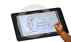 Child drawing on tablet isolated