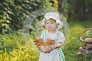 The child in the dress of a cook walking in the garden 4632.