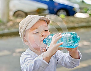 Child drinking from bottle