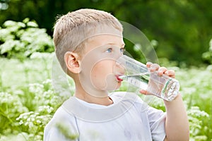 Child drinking pure water