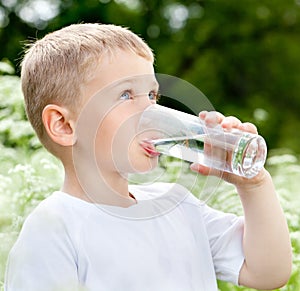 Child drinking pure water