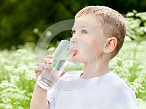 Child drinking pure water