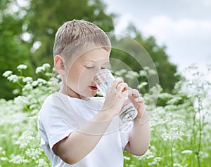 Child drinking pure water
