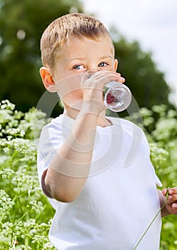 Child drinking pure water