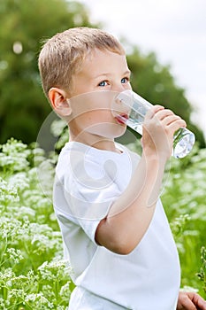 Child drinking pure water