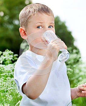 Child drinking pure water