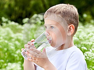 Child drinking pure water