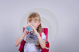 Child drinking water.