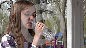 Child Drinking Water in Park, Thirsty Adolescent Girl Portrait Outdoor in Nature, Hot Summer Day, Young Children Healthcare