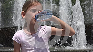Child Drinking Water in Park, Thirsty Girl Portrait View by Fountain Outdoor in a Hot Summer Day, Children Healthcare