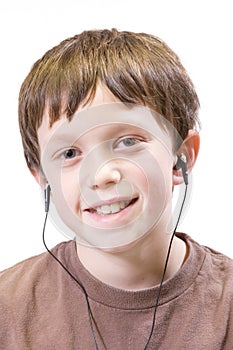 Child with earbuds