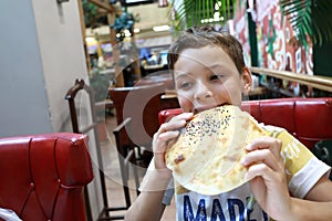 Child eating bread