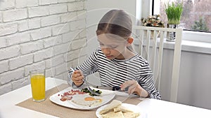 Child Eating Breakfast in Kitchen, Girl Testing Healthy Food Eggs, Vegetables