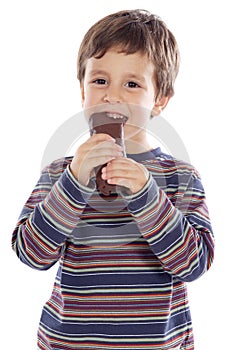 Child eating chocolat photo