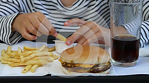 Child Eating Fast Food, Kid Eats Hamburger in Restaurant, Girl Drinking Juice