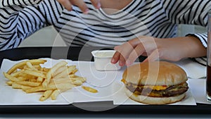 Child Eating Fast Food, Kid Eats Hamburger in Restaurant, Girl Drinking Juice