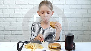 Child Eating Hamburger in Restaurant, Kid Eats Junk Fast Food Hungry Little Girl