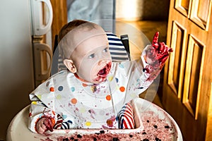 child eating in a kitchen