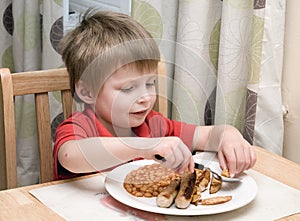 Child eating a meal.