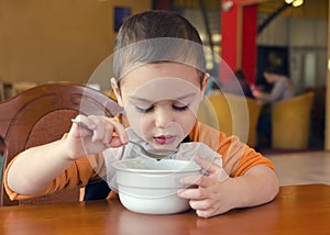 Child eating in restaurant