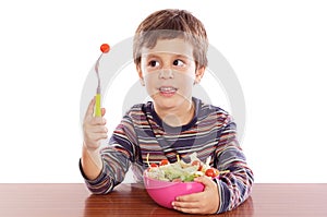 Child eating salad
