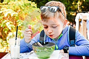 Child eating a soup