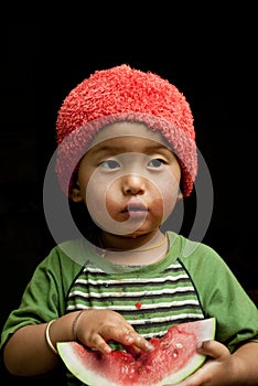 Child eating watermelon
