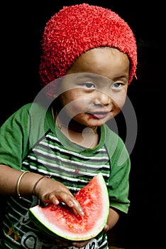 Child eating watermelon