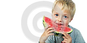 Child eating watermelon isolated on white.