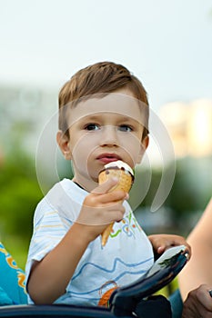 Child eats tasty ice-cream