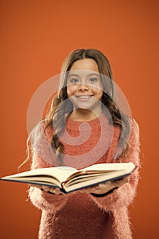 Child enjoy reading book. Book store concept. Wonderful free childrens books available to read. Reading practice for