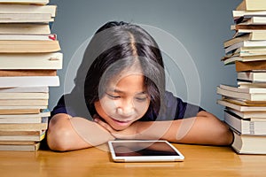 Child Enjoy Tablet More Than Books
