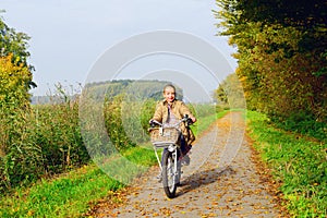 Child enjoying nature on bicycle