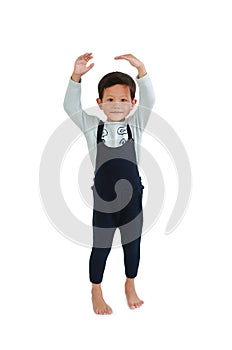 Child estimate his height by hands with looking camera. Asian little boy measures the growth isolated on white background