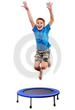 Child exercising and jumping on a trampoline