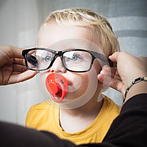 Child with eyeglasses