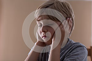 Child with eyes closed