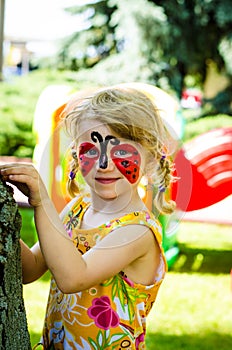 Child with face painting
