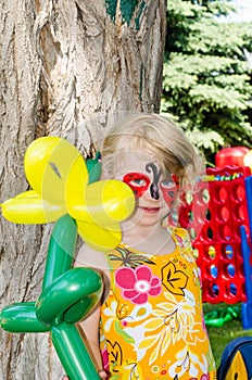 Child with face painting