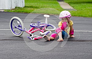 Child falling off a bike