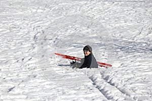 Child falls from skiing in winter