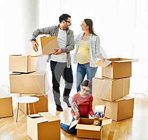 child family box home house moving happy apartment pregnant mother father daughter relocation new property parent