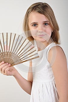 Child with a fan